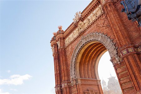 photojope (artist) - The Arc de Triomf is a memorial or triumphal arch in Barcelona, Catalonia, Spain. It is built in reddish brickwork in the Neo-Mudéjar style. Fotografie stock - Microstock e Abbonamento, Codice: 400-08373773