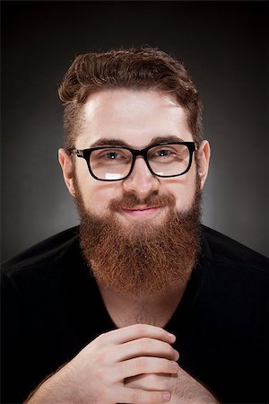 Portrait of a Teenage Hipster with Beard and Glasses Stock Photo - Budget Royalty-Free & Subscription, Code: 400-08373830