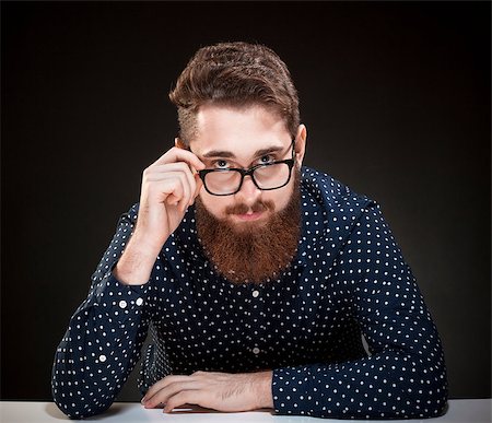Portrait of a Teenage Hipster with Beard and Glasses Stock Photo - Budget Royalty-Free & Subscription, Code: 400-08373831