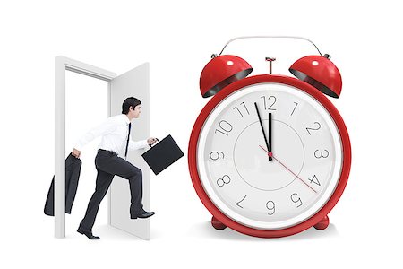 simsearch:400-08380053,k - Side view of walking tradesman with jacket and suitcase against alarm clock counting down to twelve Stockbilder - Microstock & Abonnement, Bildnummer: 400-08380048