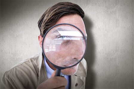 Spy looking through magnifier against white and grey background Fotografie stock - Microstock e Abbonamento, Codice: 400-08380362