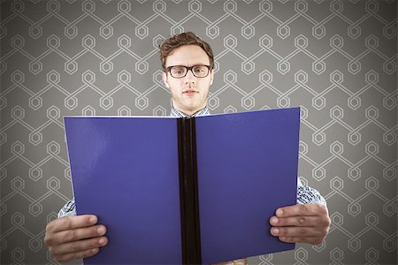 student holding books animation - Geeky student reading a book against background Stock Photo - Budget Royalty-Free & Subscription, Code: 400-08380403