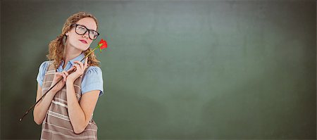 simsearch:400-08380794,k - Geeky hipster woman holding rose  against green chalkboard Stockbilder - Microstock & Abonnement, Bildnummer: 400-08380628