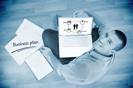 simsearch:400-07466593,k - The word business plan and business plan against young creative businessman working on laptop Stock Photo - Budget Royalty-Free & Subscription, Code: 400-08380697