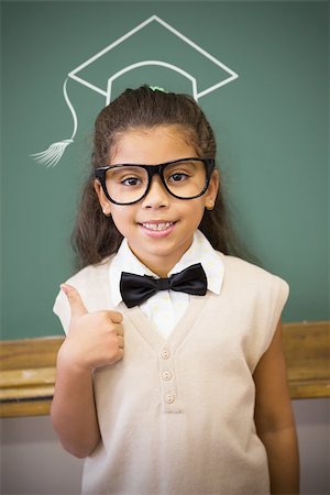 Graduation hat vector against cute pupil dressed up as teacher in classroom Stock Photo - Budget Royalty-Free & Subscription, Code: 400-08380749