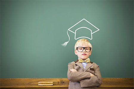 simsearch:400-07684082,k - Graduation hat vector against cute pupil dressed up as teacher in classroom Stock Photo - Budget Royalty-Free & Subscription, Code: 400-08380740