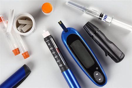 Diabetes equipment, Insulin pen and glucose level blood test Stock Photo - Budget Royalty-Free & Subscription, Code: 400-08404911
