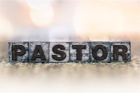 The word "PASTOR" written in vintage ink stained letterpress type. Stock Photo - Budget Royalty-Free & Subscription, Code: 400-08406074