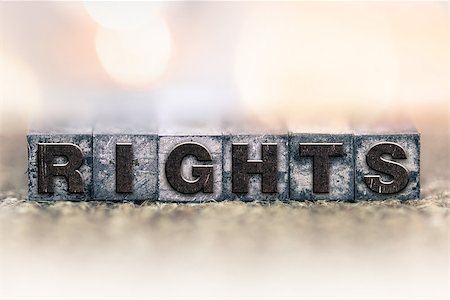 The word "RIGHTS" written in vintage ink stained letterpress type. Stockbilder - Microstock & Abonnement, Bildnummer: 400-08406100