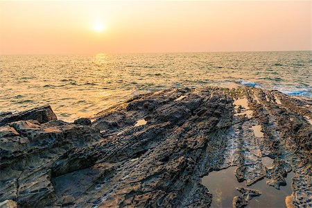 orange sunset over the sea and the bright sun Stock Photo - Budget Royalty-Free & Subscription, Code: 400-08406847