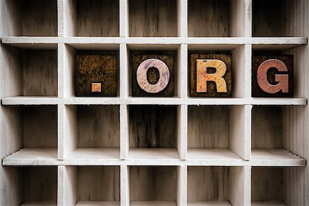 The word "DOT ORG" written in vintage ink stained wooden letterpress type in a partitioned printer's drawer. Stock Photo - Budget Royalty-Free & Subscription, Code: 400-08407000