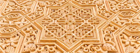 Wall detail of Alhambra UNESCO site in Granada - South of Spain. 600 years old arabic characters. Stock Photo - Budget Royalty-Free & Subscription, Code: 400-08407253