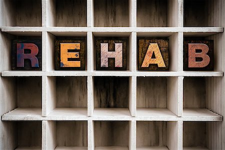 simsearch:400-08407055,k - The word "REHAB" written in vintage ink stained wooden letterpress type in a partitioned printer's drawer. Foto de stock - Super Valor sin royalties y Suscripción, Código: 400-08408199