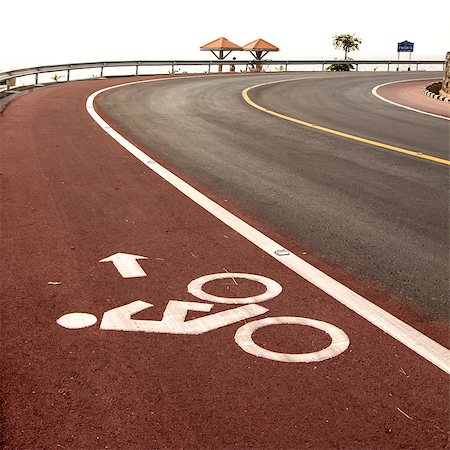 sign road paint - Bicycle road sign and arrow in outdoors Stock Photo - Budget Royalty-Free & Subscription, Code: 400-08408368