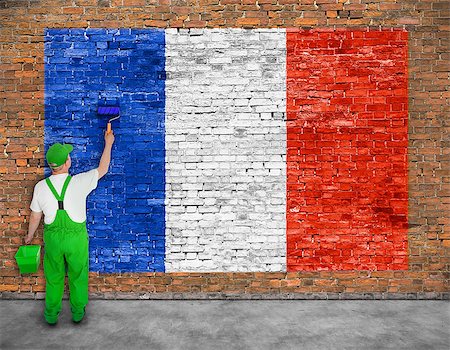 simsearch:400-08403526,k - House painter paints flag of France on old brick wall Fotografie stock - Microstock e Abbonamento, Codice: 400-08408878
