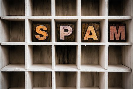 simsearch:400-08407049,k - The word "SPAM" written in vintage ink stained wooden letterpress type in a partitioned printer's drawer. Foto de stock - Super Valor sin royalties y Suscripción, Código: 400-08409129
