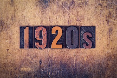 depression era - The word "1920s" written in dirty vintage letterpress type on a aged wooden background. Photographie de stock - Aubaine LD & Abonnement, Code: 400-08409376