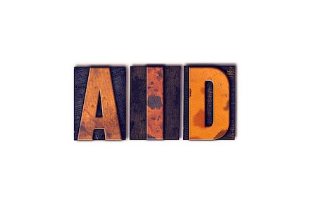 simsearch:400-08161047,k - The word "Aid" written in isolated vintage wooden letterpress type on a white background. Stock Photo - Budget Royalty-Free & Subscription, Code: 400-08409429