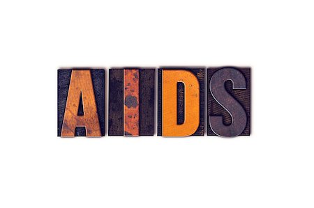 The word "AIDS" written in isolated vintage wooden letterpress type on a white background. Photographie de stock - Aubaine LD & Abonnement, Code: 400-08409432