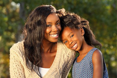 simsearch:400-04236555,k - Happy Mother and Child Spending Time Toogether in a Park Photographie de stock - Aubaine LD & Abonnement, Code: 400-08400424