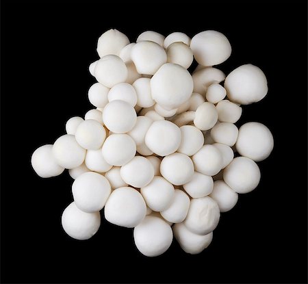 simsearch:400-07217319,k - White beech mushrooms, bunapi shimeji, also called white clamshell mushrooms, an edible fungus on black background. Top view macro photo. Stock Photo - Budget Royalty-Free & Subscription, Code: 400-08400504