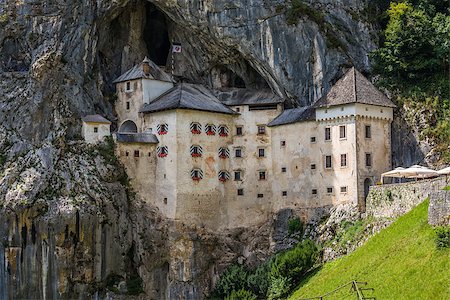 simsearch:400-05119652,k - Renaissance Castle Built Inside Rocky Mountain in Predjama, Slovenia. Famous Tourist Place in Europe. Stock Photo - Budget Royalty-Free & Subscription, Code: 400-08401529