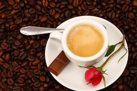 White cup of coffee with red rose Stock Photo - Budget Royalty-Free & Subscription, Code: 400-08402646