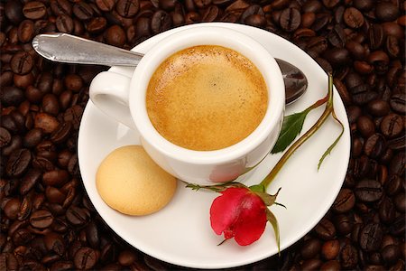 White cup of coffee with red rose Stock Photo - Budget Royalty-Free & Subscription, Code: 400-08402647