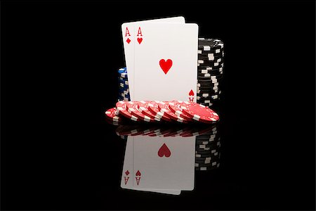 simsearch:400-04795607,k - Poker cards on black background with reflexion Stock Photo - Budget Royalty-Free & Subscription, Code: 400-08402691
