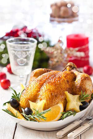 simsearch:400-07626095,k - Whole roasted orange chicken with fruit garnish and rosemary for Christmas dinner. Stock Photo - Budget Royalty-Free & Subscription, Code: 400-08402731
