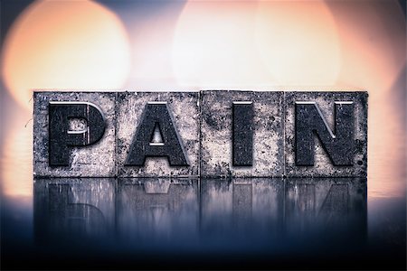 The word "PAIN" written in vintage ink stained letterpress type. Stock Photo - Budget Royalty-Free & Subscription, Code: 400-08402849