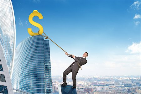 dollar sign and building illustration - Businessman climbing skyscraper holding golden dollar sign Stock Photo - Budget Royalty-Free & Subscription, Code: 400-08403346