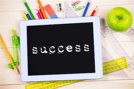 The word success against students table with school supplies Stock Photo - Budget Royalty-Free & Subscription, Code: 400-08414477