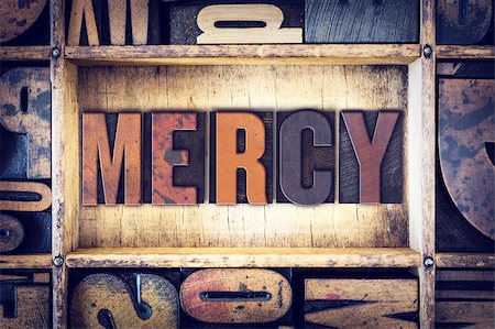 The word "Mercy" written in vintage wooden letterpress type. Photographie de stock - Aubaine LD & Abonnement, Code: 400-08410162