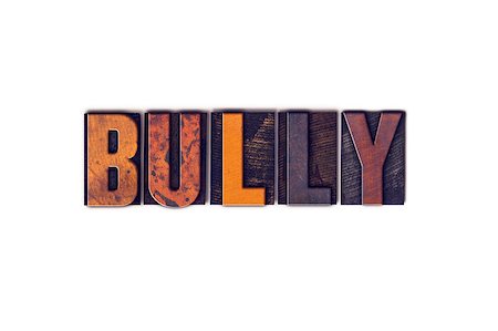 The word "Bully" written in isolated vintage wooden letterpress type on a white background. Stock Photo - Budget Royalty-Free & Subscription, Code: 400-08411066