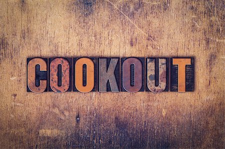 pig roast - The word "Cookout" written in dirty vintage letterpress type on a aged wooden background. Stock Photo - Budget Royalty-Free & Subscription, Code: 400-08411077