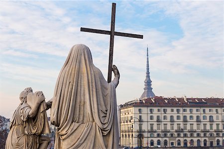 Religion Statue with cross - located in front of Gran Madre Church, Turin Stock Photo - Budget Royalty-Free & Subscription, Code: 400-08413197