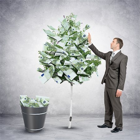 Businessman collecting money from tree with bucket full of money Stock Photo - Budget Royalty-Free & Subscription, Code: 400-08413596