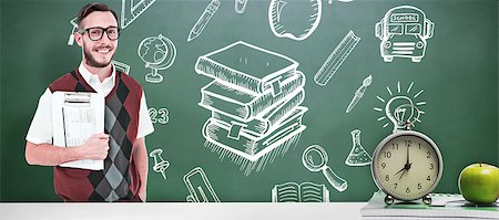 simsearch:400-07683612,k - Geeky man holding clipboard in vest against green chalkboard Stock Photo - Budget Royalty-Free & Subscription, Code: 400-08413971