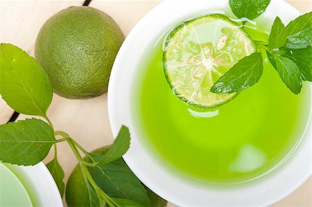 simsearch:649-07119030,k - fresh and healthy mint infusion tea tisane with lime Stock Photo - Budget Royalty-Free & Subscription, Code: 400-08426996