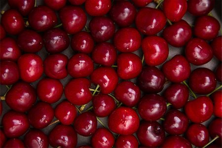 Fresh red cherry texture, top view Stock Photo - Budget Royalty-Free & Subscription, Code: 400-08427005