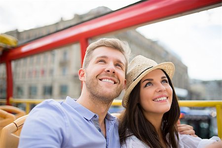 Smiling couple at the tour bus Stock Photo - Budget Royalty-Free & Subscription, Code: 400-08427020