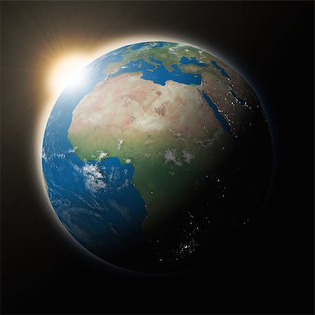 simsearch:400-08427636,k - Sun over Africa on blue planet Earth isolated on black background. Highly detailed planet surface. Elements of this image furnished by NASA. Foto de stock - Super Valor sin royalties y Suscripción, Código: 400-08427068