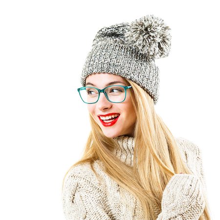 Smiling Hipster Girl in Knitted Sweater and Beanie Hat Isolated on White. Youth Winter Fashion Concept. Fotografie stock - Microstock e Abbonamento, Codice: 400-08427241