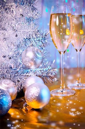 Christmas tree, toy balloons and glasses of wine with evening lighting Stock Photo - Budget Royalty-Free & Subscription, Code: 400-08427363