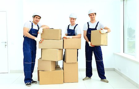 workers unload boxes Stock Photo - Budget Royalty-Free & Subscription, Code: 400-08427416