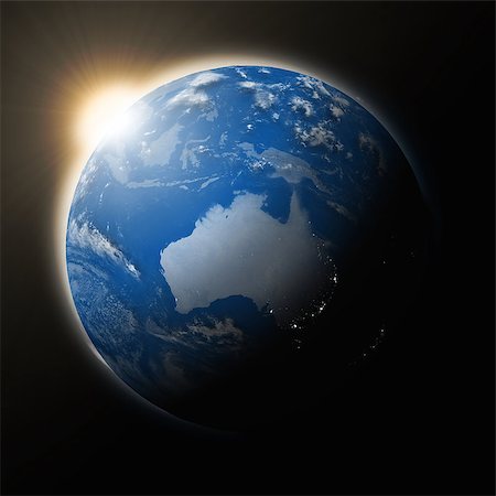 simsearch:614-06813417,k - Sun over Australia on blue planet Earth isolated on black background. Highly detailed planet surface. Elements of this image furnished by NASA. Photographie de stock - Aubaine LD & Abonnement, Code: 400-08427601