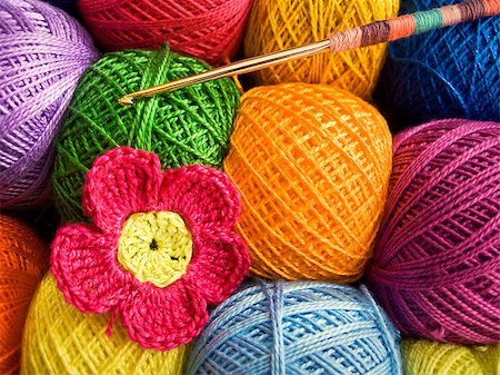 Crochet hook with a ball of colored thread Stockbilder - Microstock & Abonnement, Bildnummer: 400-08427858