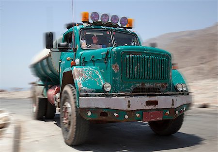 Vintage Egyptian water tanker truck racing thru desert with speed blur Stock Photo - Budget Royalty-Free & Subscription, Code: 400-08428292