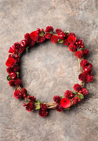 Christmas, New Year wreath with apples, cones and flowers on a dark stone background Copy space Photographie de stock - Aubaine LD & Abonnement, Code: 400-08428303